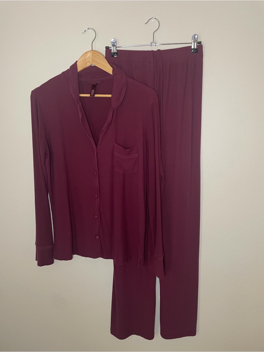 Skims long sleeve burgundy button down pajama set